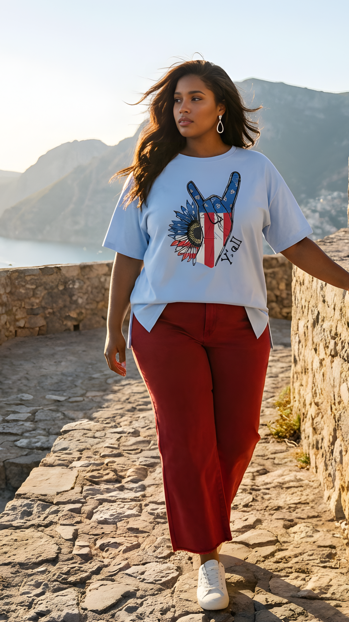 Model wearing red high-rise wide-leg cropped jeans with a light graphic top.