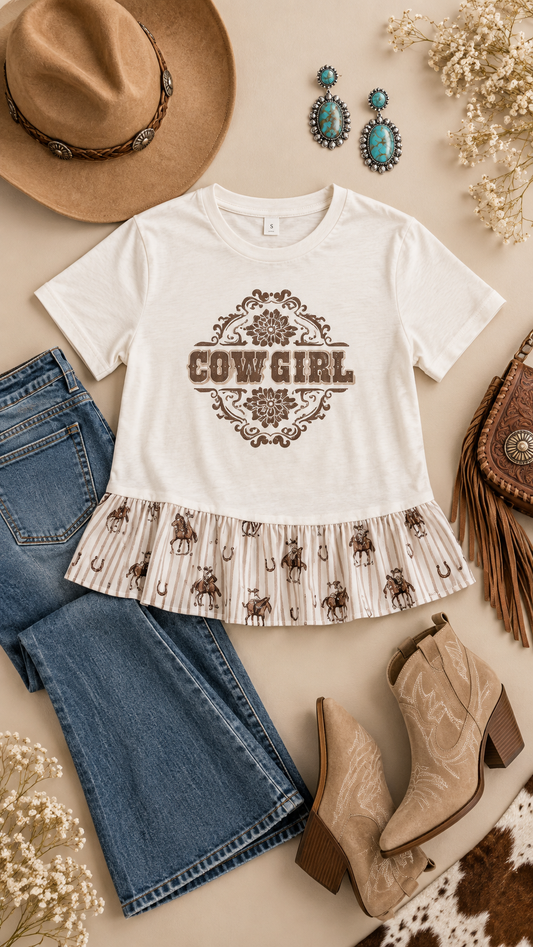 Flat lay of a white Cowgirl graphic ruffle tee styled with jeans and Western accessories.