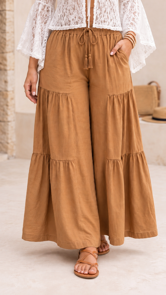 Front view of sienna-brown tiered wide-leg palazzo pants.