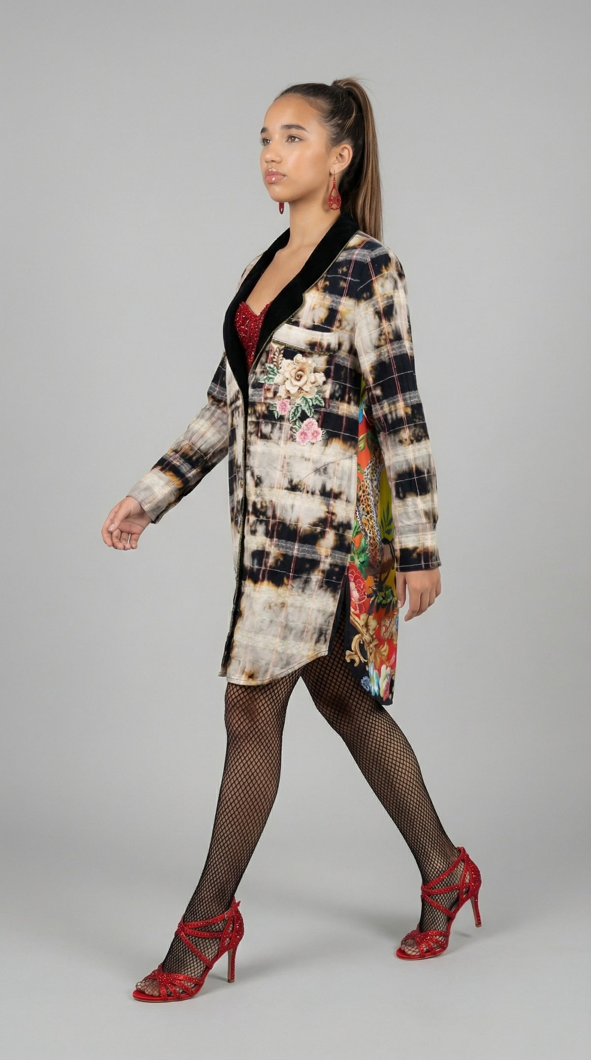 Long collage-print shirt dress with black-and-white checks and colorful graphics.